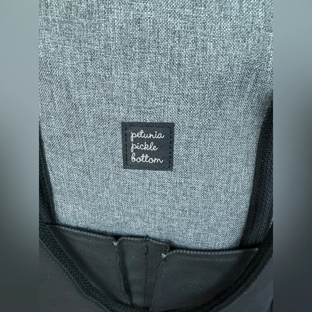 Petunia Pickle Bottom gray & black backpack shoulder diaper bag.